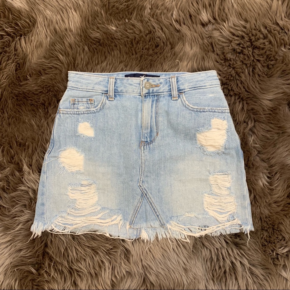 High rise light wash ripped denim skirt